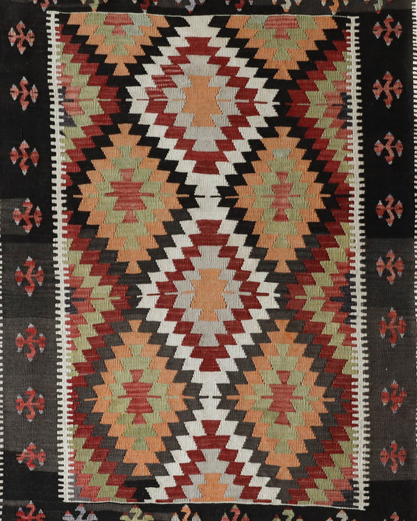 Vintage kilim rug in room decor setting, old rug, antique rug, pastel colors, faded colors, Turkish rug, vintage rug, soft rug, Portland, Oregon, rug store, rug shop, local shop,  antique kilim rug, bold colors, bright colors, faded colors