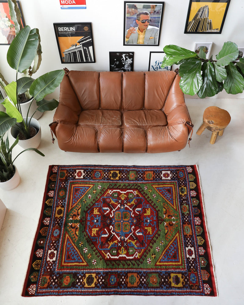 Vintage Turkish rug in a living room setting, Area rug in a living room setting, pile rug, Turkish rug, modern rug, customizable rug, portland, rug shop, bright colors, wild shaman, soft rug, bold color, Portland, Oregon, rug store, rug shop, local shop, made in Turkey