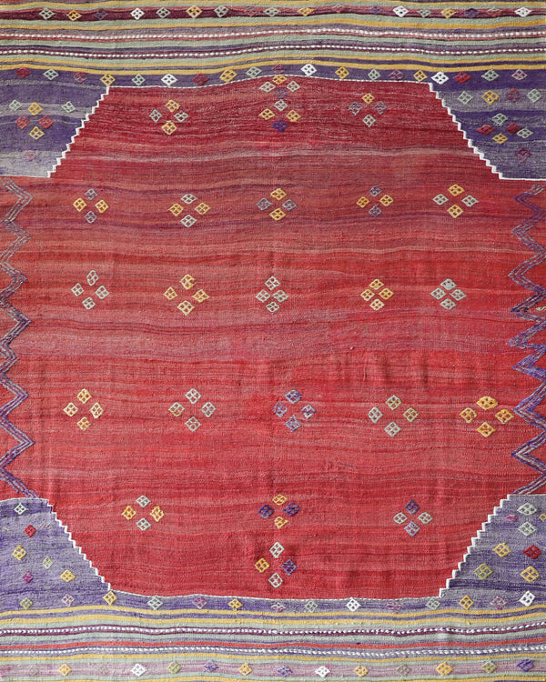 Vintage kilim rug in room decor setting, old rug, antique rug, pastel colors, faded colors, Turkish rug, vintage rug, soft rug, Portland, Oregon, rug store, rug shop, local shop,  antique kilim rug, bold colors, bright colors, faded colors