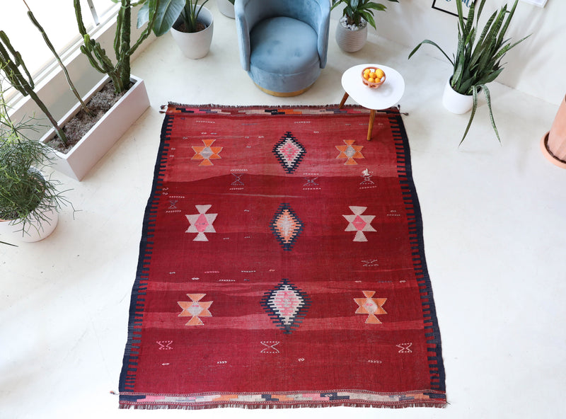 Vintage kilim rug in living room setting, bright colors, wild shaman, soft rug, bold color, Portland, Oregon, rug store, rug shop, local shop, vintage rug, modern kilim, warm colors