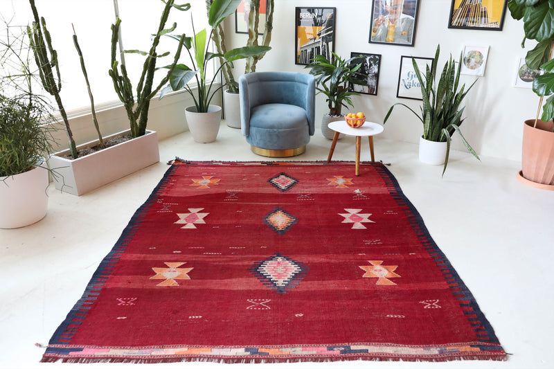 Vintage kilim rug in living room setting, bright colors, wild shaman, soft rug, bold color, Portland, Oregon, rug store, rug shop, local shop, vintage rug, modern kilim, warm colors