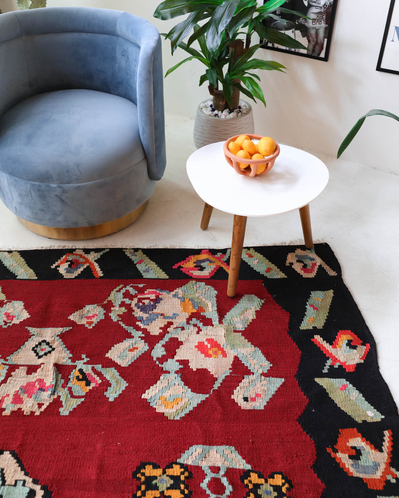 Vintage kilim rug in living room setting, bright colors, wild shaman, soft rug, bold color, Portland, Oregon, rug store, rug shop, local shop, vintage rug, modern kilim, warm colors