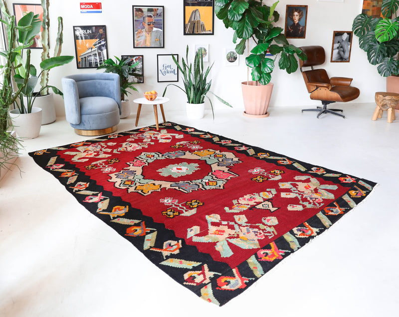 Vintage kilim rug in living room setting, bright colors, wild shaman, soft rug, bold color, Portland, Oregon, rug store, rug shop, local shop, vintage rug, modern kilim, warm colors