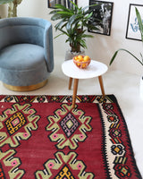 Vintage kilim rug in living room setting, bright colors, wild shaman, soft rug, bold color, Portland, Oregon, rug store, rug shop, local shop, vintage rug, modern kilim, warm colors