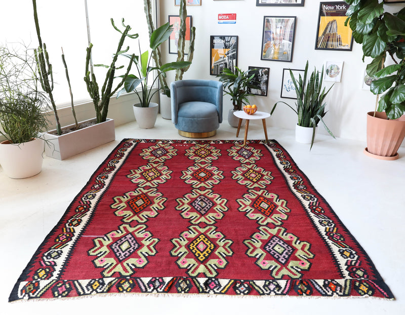 Vintage kilim rug in living room setting, bright colors, wild shaman, soft rug, bold color, Portland, Oregon, rug store, rug shop, local shop, vintage rug, modern kilim, warm colors