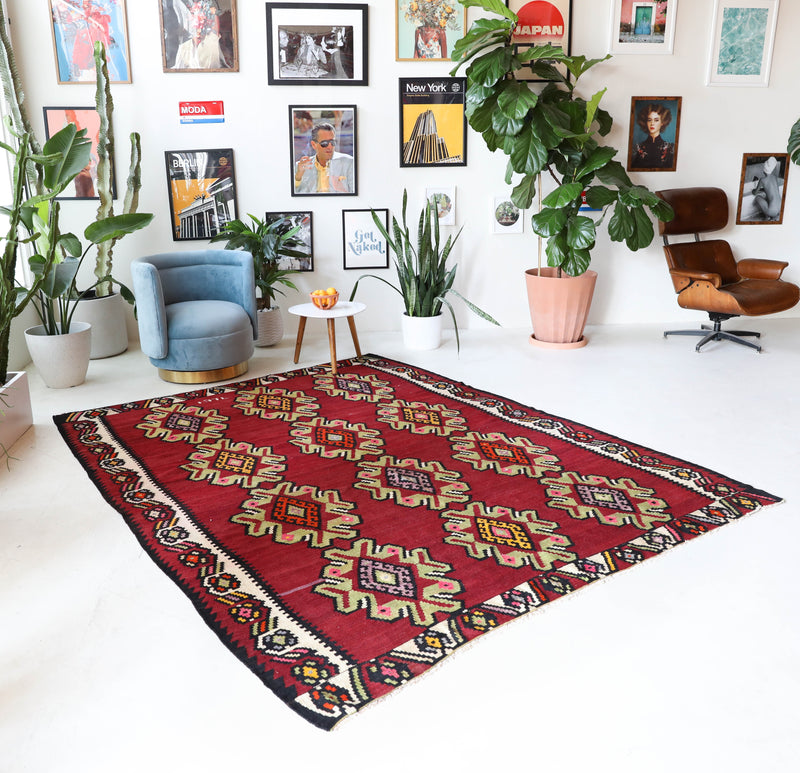 Vintage kilim rug in living room setting, bright colors, wild shaman, soft rug, bold color, Portland, Oregon, rug store, rug shop, local shop, vintage rug, modern kilim, warm colors