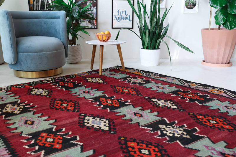 Vintage kilim rug in living room setting, bright colors, wild shaman, soft rug, bold color, Portland, Oregon, rug store, rug shop, local shop, vintage rug, modern kilim, warm colors