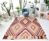 Vintage kilim rug in room decor setting, old rug, antique rug, pastel colors, faded colors, Turkish rug, vintage rug, soft rug, Portland, Oregon, rug store, rug shop, local shop,  antique kilim rug, bold colors, bright colors, faded colors