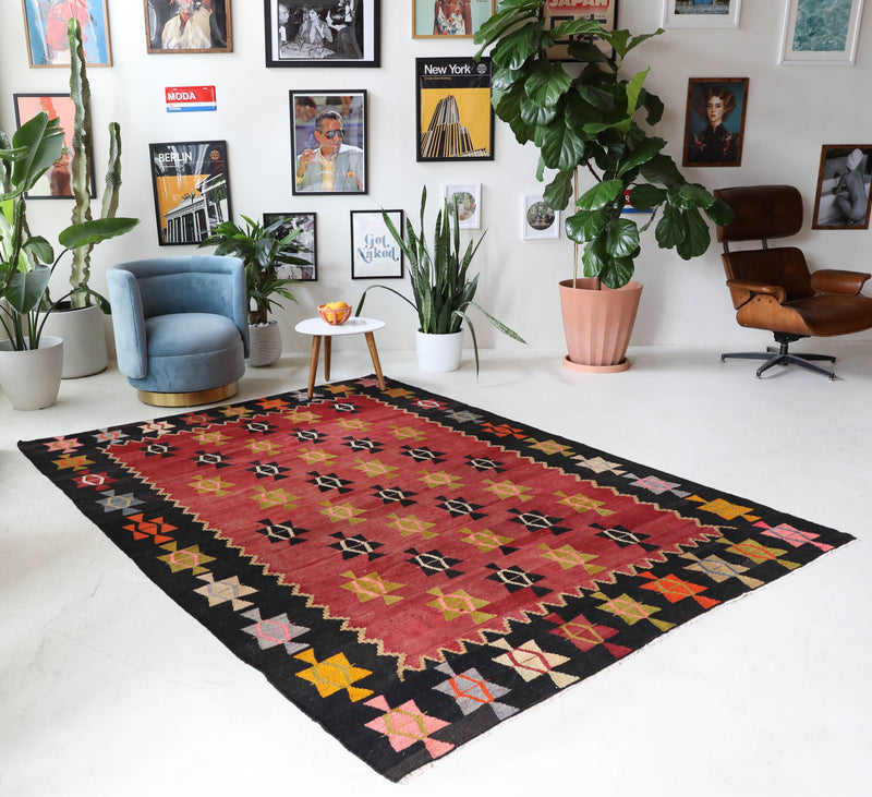 Vintage kilim rug in living room setting, bright colors, wild shaman, soft rug, bold color, Portland, Oregon, rug store, rug shop, local shop, vintage rug, modern kilim, warm colors