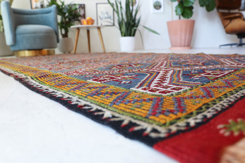 Vintage kilim rug in living room setting, bright colors, wild shaman, soft rug, bold color, Portland, Oregon, rug store, rug shop, local shop, vintage rug, modern kilim, warm colors