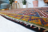 Vintage kilim rug in living room setting, bright colors, wild shaman, soft rug, bold color, Portland, Oregon, rug store, rug shop, local shop, vintage rug, modern kilim, warm colors