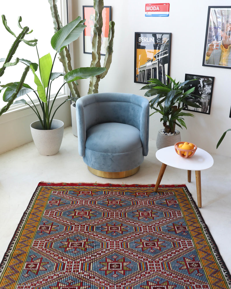 Vintage kilim rug in living room setting, bright colors, wild shaman, soft rug, bold color, Portland, Oregon, rug store, rug shop, local shop, vintage rug, modern kilim, warm colors