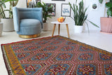 Vintage kilim rug in living room setting, bright colors, wild shaman, soft rug, bold color, Portland, Oregon, rug store, rug shop, local shop, vintage rug, modern kilim, warm colors