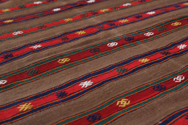 Vintage kilim rug in living room setting, bright colors, wild shaman, soft rug, bold color, Portland, Oregon, rug store, rug shop, local shop, vintage rug, modern kilim, warm colors