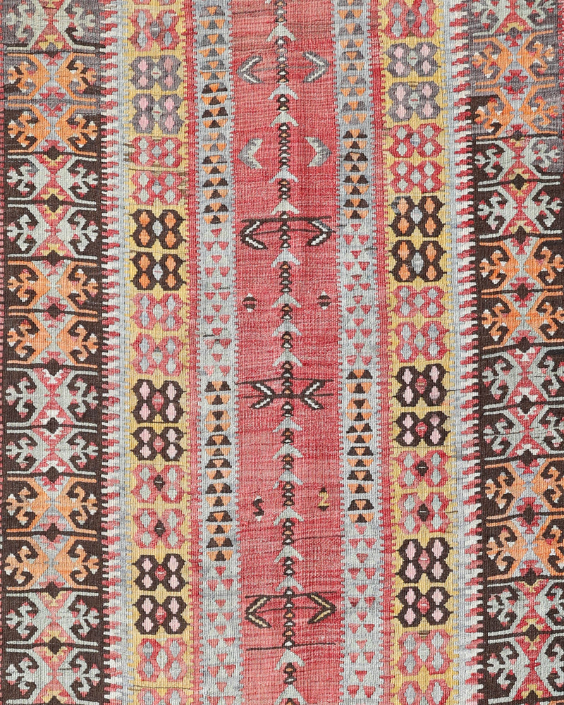 Vintage Turkish runner rug in living room setting, old rug, antique rug, pastel colors, faded colors, Turkish rug, vintage rug, soft rug, Portland, Oregon, rug store, rug shop, local shop