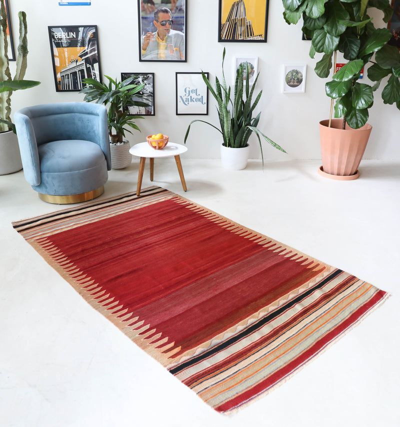 Vintage kilim rug in living room setting, bright colors, wild shaman, soft rug, bold color, Portland, Oregon, rug store, rug shop, local shop, vintage rug, modern kilim, warm colors