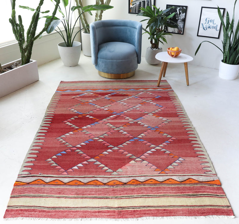  Vintage kilim rug in living room setting, bright colors, wild shaman, soft rug, bold color, Portland, Oregon, rug store, rug shop, local shop, vintage rug, modern kilim, warm colors