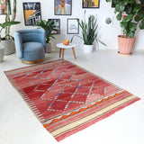  Vintage kilim rug in living room setting, bright colors, wild shaman, soft rug, bold color, Portland, Oregon, rug store, rug shop, local shop, vintage rug, modern kilim, warm colors