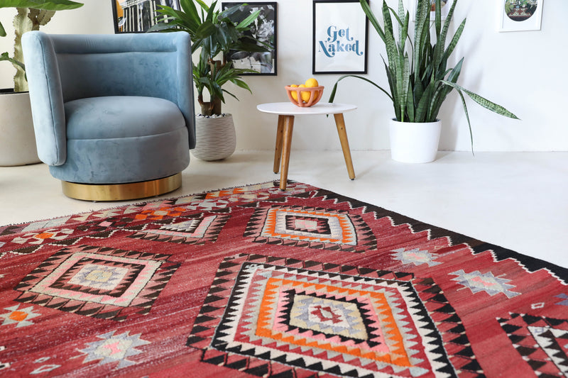 Vintage kilim rug in living room setting, bright colors, wild shaman, soft rug, bold color, Portland, Oregon, rug store, rug shop, local shop, vintage rug, modern kilim, warm colors