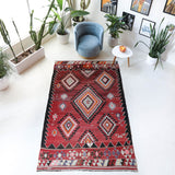 Vintage kilim rug in living room setting, bright colors, wild shaman, soft rug, bold color, Portland, Oregon, rug store, rug shop, local shop, vintage rug, modern kilim, warm colors