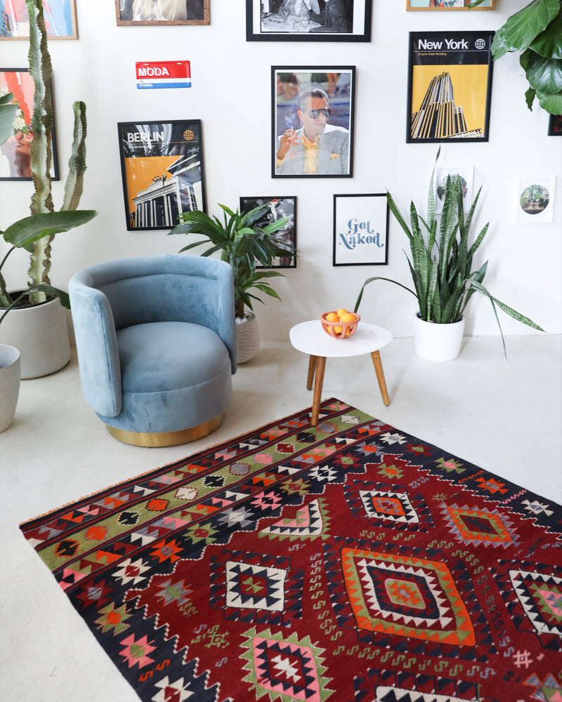 Vintage kilim rug in living room setting, bright colors, wild shaman, soft rug, bold color, Portland, Oregon, rug store, rug shop, local shop, vintage rug, modern kilim, warm colors