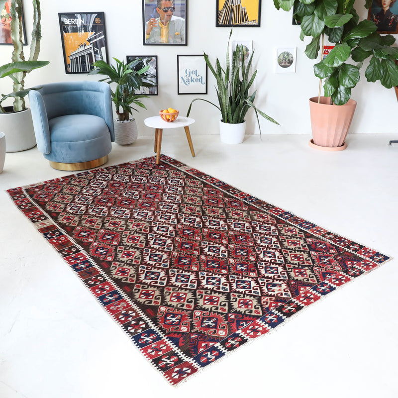 Vintage kilim rug in living room setting, bright colors, wild shaman, soft rug, bold color, Portland, Oregon, rug store, rug shop, local shop, vintage rug, modern kilim, warm colors