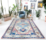 Vintage Turkish rug in living room setting, old rug, antique rug, pastel colors, faded colors, Turkish rug, vintage rug, soft rug, Portland, Oregon, rug store, rug shop, local shop