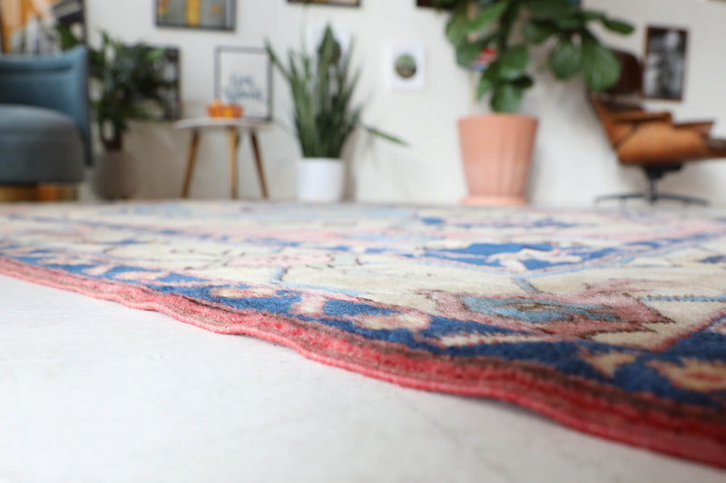 Vintage Turkish rug in living room setting, old rug, antique rug, pastel colors, faded colors, Turkish rug, vintage rug, soft rug, Portland, Oregon, rug store, rug shop, local shop