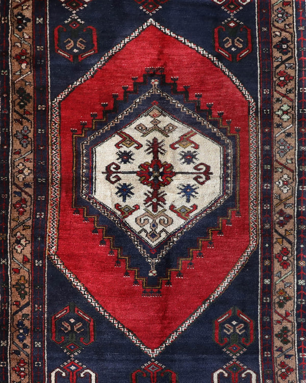 Vintage Turkish rug in a living room setting, pile rug, Turkish rug, vintage rug, portland, rug shop, bright colors, wild shaman, soft rug, bold color, Portland, Oregon, rug store, rug shop, local shop, antique rug