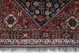 Antique Persian  rug in a living room setting, pile rug, vintage rug, portland, rug shop, bright colors, wild shaman, soft rug, bold color, Portland, Oregon, rug store, rug shop, local shop, antique rug, Persian rug, handmade rug, wool rug, distressed rug