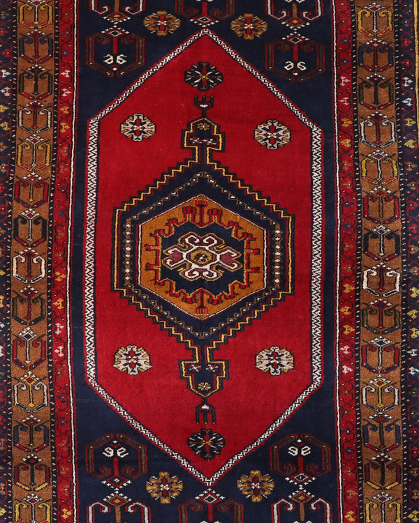 Vintage Turkish rug in a living room setting, pile rug, Turkish rug, vintage rug, portland, rug shop, bright colors, wild shaman, soft rug, bold color, Portland, Oregon, rug store, rug shop, local shop, antique rug