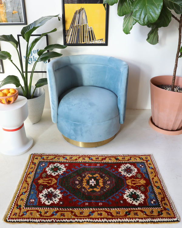 Vintage Turkish rug in a living room setting, pile rug, Turkish rug, vintage rug, portland, rug shop, bright colors, wild shaman, soft rug, bold color, Portland, Oregon, rug store, rug shop, local shop, antique rug