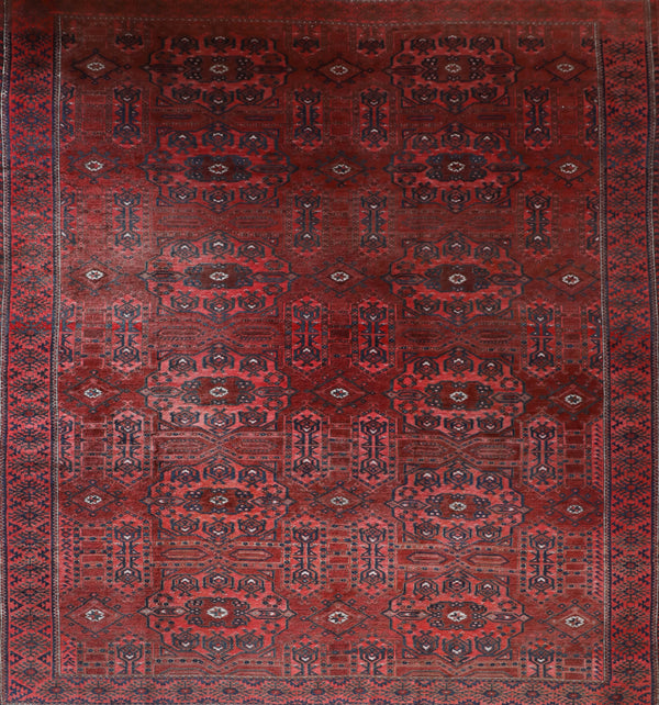 Antique Turkmen rug in a living room setting, pile rug, Turkish rug, vintage rug, portland, rug shop, bright colors, wild shaman, soft rug, bold color, Portland, Oregon, rug store, rug shop, local shop, antique rug