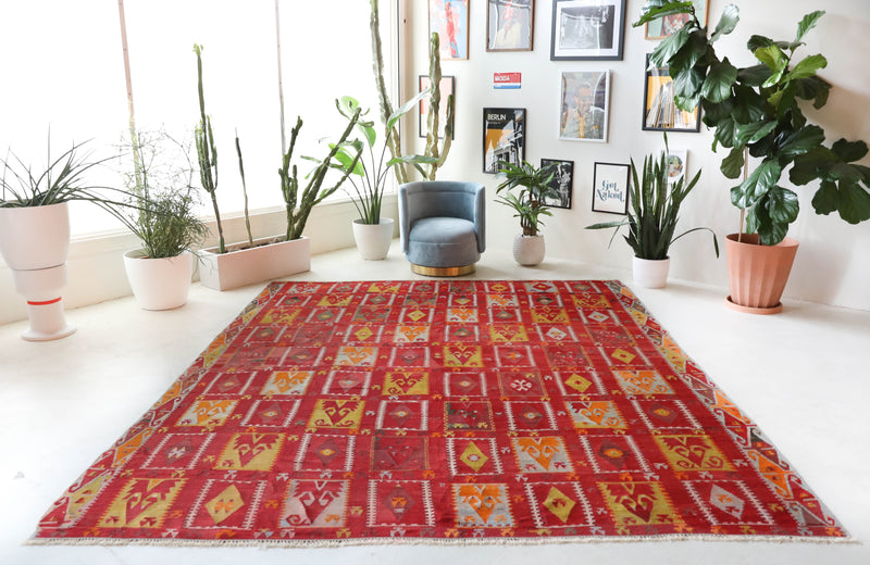 Vintage kilim rug in living room setting, bright colors, wild shaman, soft rug, bold color, Portland, Oregon, rug store, rug shop, local shop, vintage rug, modern kilim, warm colors