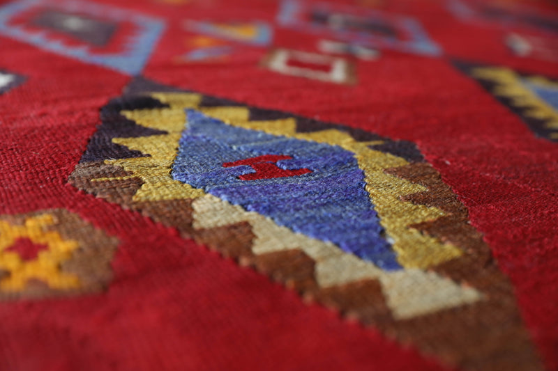 Vintage kilim rug in living room setting, bright colors, wild shaman, soft rug, bold color, Portland, Oregon, rug store, rug shop, local shop, vintage rug, modern kilim, warm colors