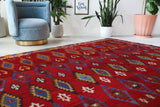 Vintage kilim rug in living room setting, bright colors, wild shaman, soft rug, bold color, Portland, Oregon, rug store, rug shop, local shop, vintage rug, modern kilim, warm colors