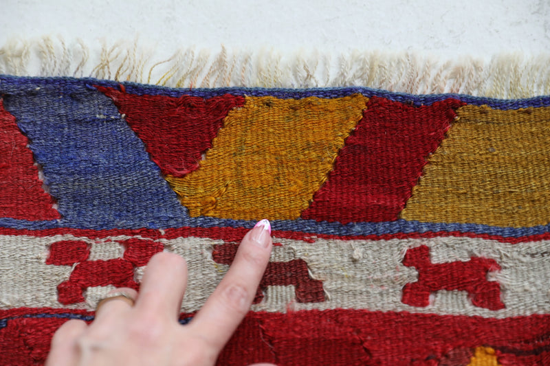 Vintage kilim rug in living room setting, bright colors, wild shaman, soft rug, bold color, Portland, Oregon, rug store, rug shop, local shop, vintage rug, modern kilim, warm colors