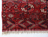 Antique Turkmen rug in a living room setting, pile rug, Turkish rug, vintage rug, portland, rug shop, bright colors, wild shaman, soft rug, bold color, Portland, Oregon, rug store, rug shop, local shop, antique rug