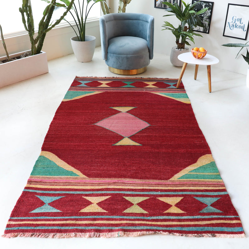 Vintage kilim rug in living room setting, bright colors, wild shaman, soft rug, bold color, Portland, Oregon, rug store, rug shop, local shop, vintage rug, modern kilim, warm colors