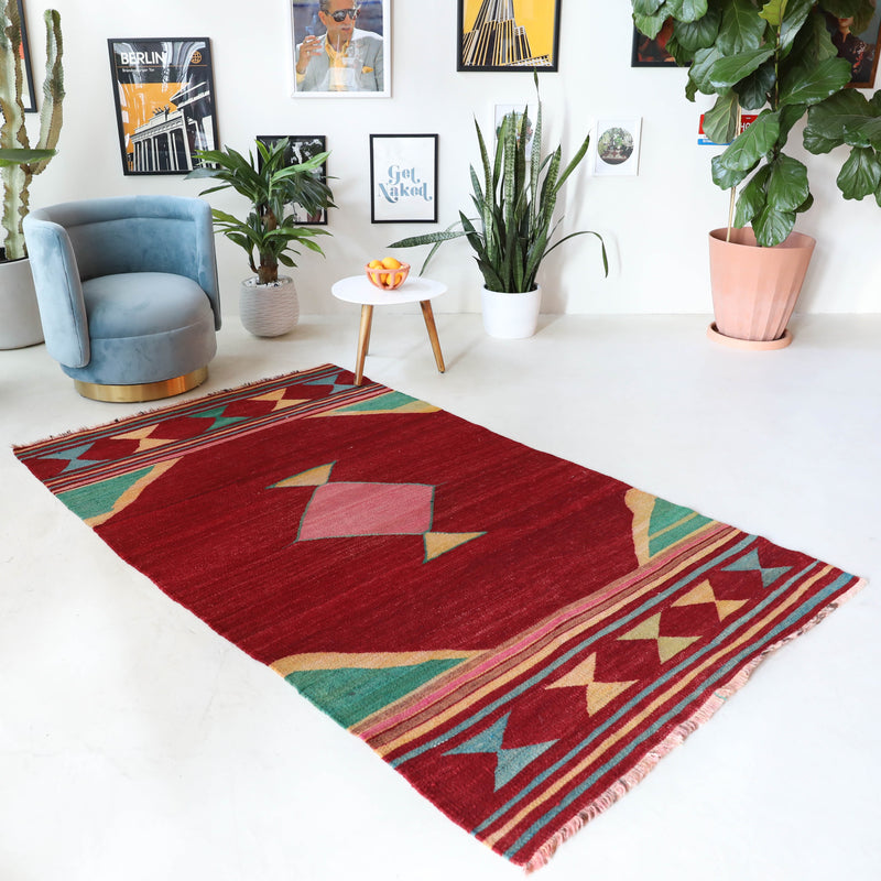 Vintage kilim rug in living room setting, bright colors, wild shaman, soft rug, bold color, Portland, Oregon, rug store, rug shop, local shop, vintage rug, modern kilim, warm colors