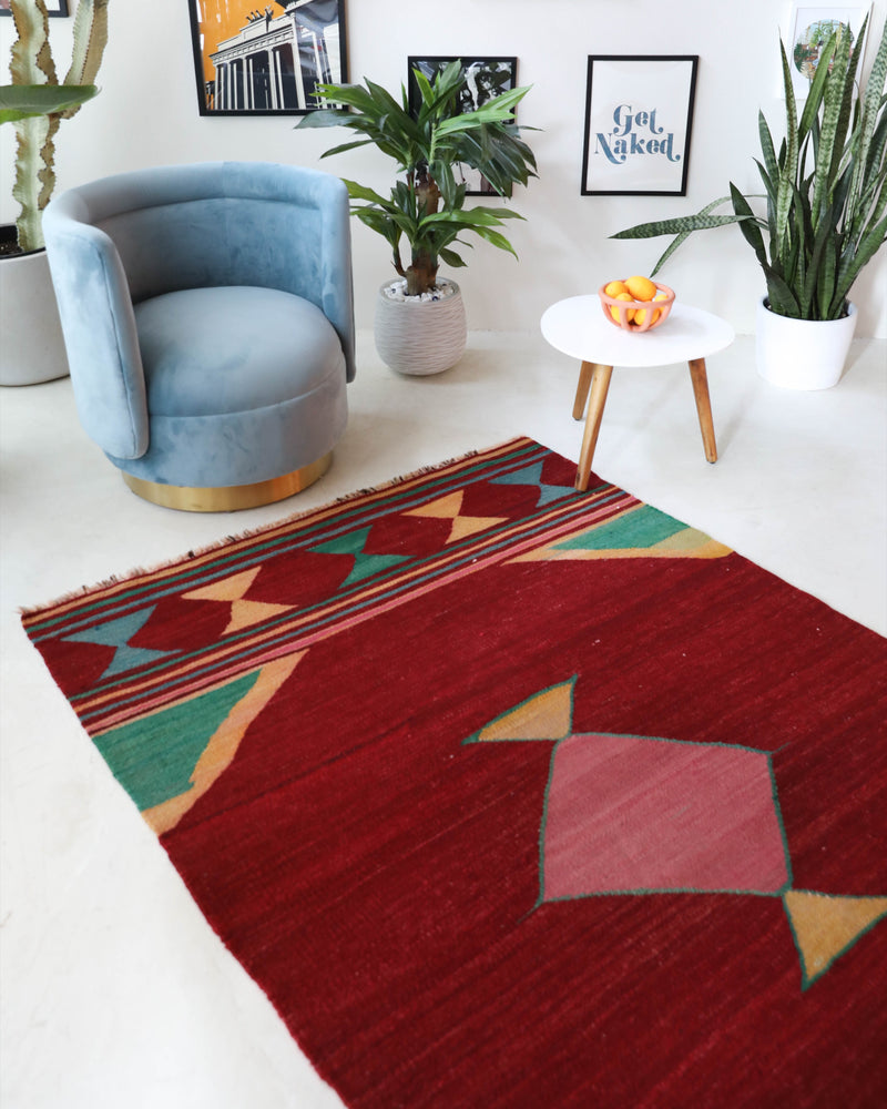 Vintage kilim rug in living room setting, bright colors, wild shaman, soft rug, bold color, Portland, Oregon, rug store, rug shop, local shop, vintage rug, modern kilim, warm colors