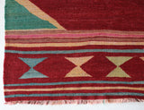 Vintage kilim rug in living room setting, bright colors, wild shaman, soft rug, bold color, Portland, Oregon, rug store, rug shop, local shop, vintage rug, modern kilim, warm colors