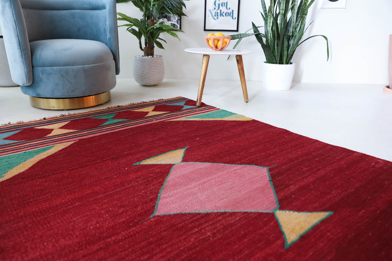 Vintage kilim rug in living room setting, bright colors, wild shaman, soft rug, bold color, Portland, Oregon, rug store, rug shop, local shop, vintage rug, modern kilim, warm colors