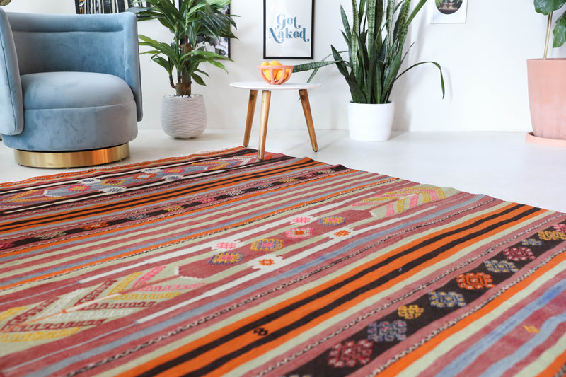 Vintage kilim rug in living room setting, bright colors, wild shaman, soft rug, bold color, Portland, Oregon, rug store, rug shop, local shop, vintage rug, modern kilim, warm colors