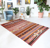 Vintage kilim rug in living room setting, bright colors, wild shaman, soft rug, bold color, Portland, Oregon, rug store, rug shop, local shop, vintage rug, modern kilim, warm colors