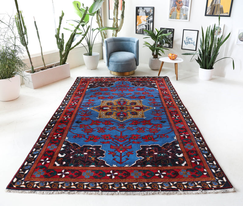 Vintage Turkish rug in a living room setting, Area rug in a living room setting, pile rug, Turkish rug, custom rug, modern rug, portland, rug shop, bright colors, wild shaman, soft rug, bold color, Portland, Oregon, rug store, rug shop, local shop