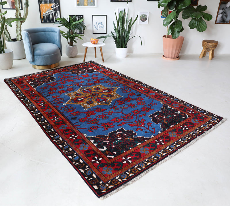 Vintage Turkish rug in a living room setting, Area rug in a living room setting, pile rug, Turkish rug, custom rug, modern rug, portland, rug shop, bright colors, wild shaman, soft rug, bold color, Portland, Oregon, rug store, rug shop, local shop