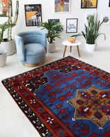 Vintage Turkish rug in a living room setting, Area rug in a living room setting, pile rug, Turkish rug, custom rug, modern rug, portland, rug shop, bright colors, wild shaman, soft rug, bold color, Portland, Oregon, rug store, rug shop, local shop