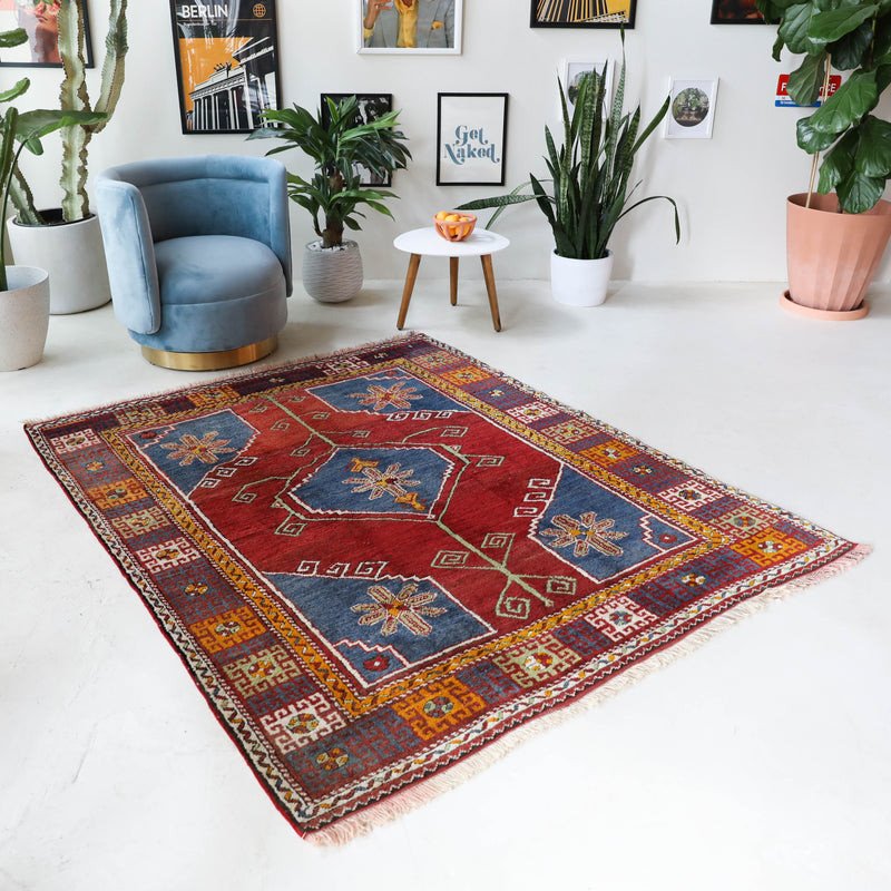 Vintage Turkish rug in a living room setting, Area rug in a living room setting, pile rug, Turkish rug, custom rug, modern rug, portland, rug shop, bright colors, wild shaman, soft rug, bold color, Portland, Oregon, rug store, rug shop, local shop