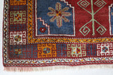 Vintage Turkish rug in a living room setting, Area rug in a living room setting, pile rug, Turkish rug, custom rug, modern rug, portland, rug shop, bright colors, wild shaman, soft rug, bold color, Portland, Oregon, rug store, rug shop, local shop